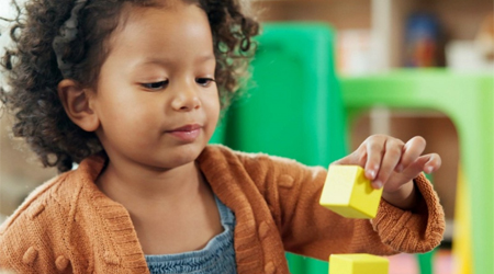 Girl with building blocks